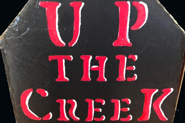 up-the-creek-ladies-consignment-boutique-sign